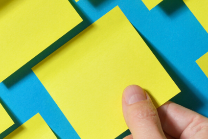 Several yellow sticky notes on a blue background
