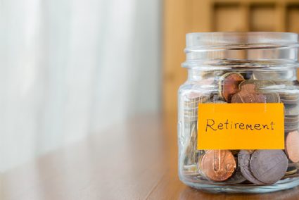 Jar of coins with the words "retirement" written